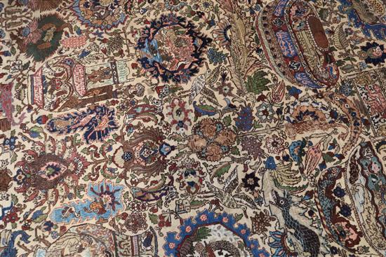 A Tabriz picture carpet, 10ft 11in by 8ft.